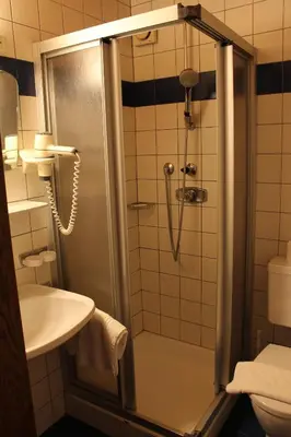 Ein Badezimmer in der Unterkunft Hotel Grafenwirt