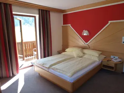 Ein Bett oder Betten in einem Zimmer der Unterkunft Salzburger Stubn