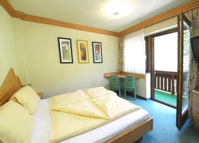 Ein Bett oder Betten in einem Zimmer der Unterkunft Salzburger Stubn