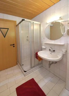 Ein Badezimmer in der Unterkunft Salzburger Stubn