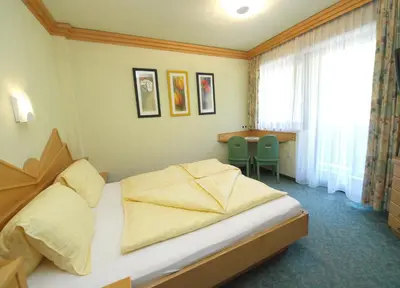 Ein Bett oder Betten in einem Zimmer der Unterkunft Salzburger Stubn