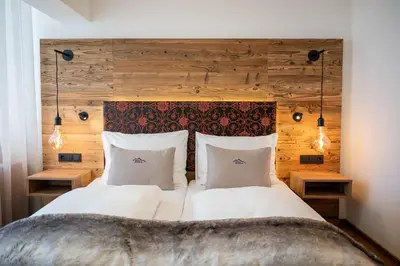 Ein Bett oder Betten in einem Zimmer der Unterkunft Hotel Zehnerkar & Hotel Obertauern