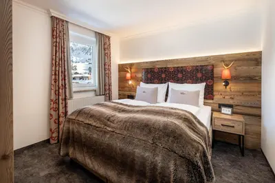 Ein Bett oder Betten in einem Zimmer der Unterkunft Hotel Zehnerkar & Hotel Obertauern