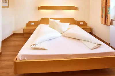 Ein Bett oder Betten in einem Zimmer der Unterkunft Sonnberg Ferienanlage