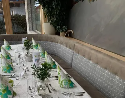 Ein Restaurant oder anderes Speiselokal in der Unterkunft Hotel Alpina