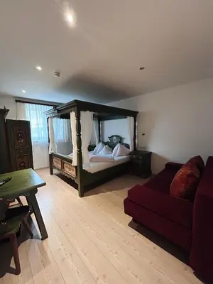 Ein Bett oder Betten in einem Zimmer der Unterkunft Bauernhofurlaub Sinnhubgut