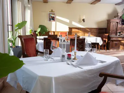 Ein Restaurant oder anderes Speiselokal in der Unterkunft Sporthotel Radstadt