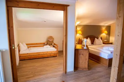 Ein Bett oder Betten in einem Zimmer der Unterkunft Sporthotel Radstadt