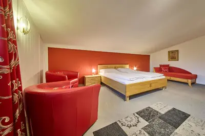 Ein Bett oder Betten in einem Zimmer der Unterkunft Ferienwohnung Brigitte