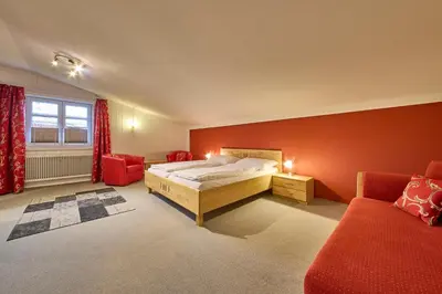 Ein Bett oder Betten in einem Zimmer der Unterkunft Ferienwohnung Brigitte