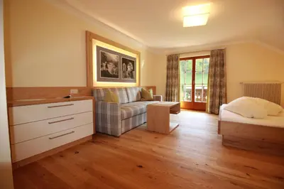 Ein Bett oder Betten in einem Zimmer der Unterkunft Landhotel Hochlackenhof