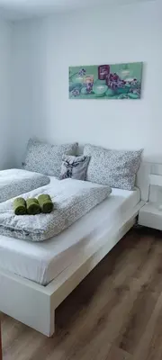 Ein Bett oder Betten in einem Zimmer der Unterkunft Appartement Gern