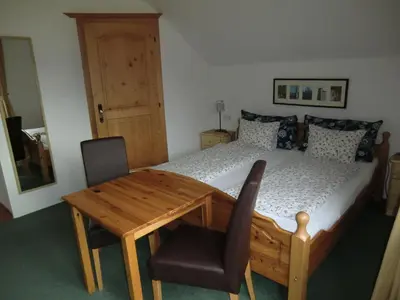 Ein Bett oder Betten in einem Zimmer der Unterkunft Haus Rye B&B
