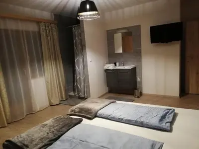 Ein Bett oder Betten in einem Zimmer der Unterkunft Holiday House Spanner