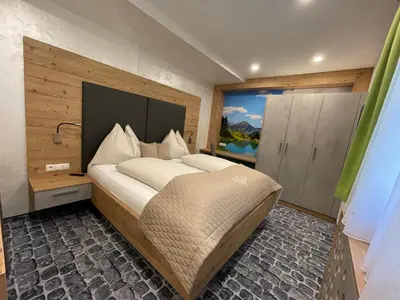 Ein Bett oder Betten in einem Zimmer der Unterkunft Sun Chalet