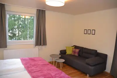 Ein Bett oder Betten in einem Zimmer der Unterkunft Pension Adlerhorst