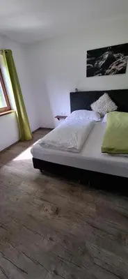 Ein Bett oder Betten in einem Zimmer der Unterkunft Ferienhaus Strasser