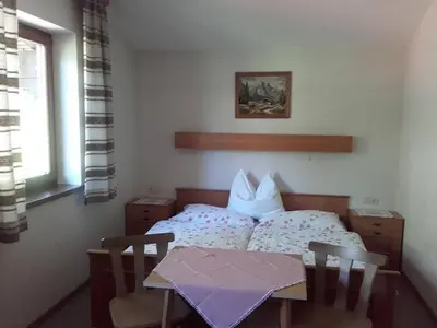 Ein Bett oder Betten in einem Zimmer der Unterkunft Ferienhaus Strasser
