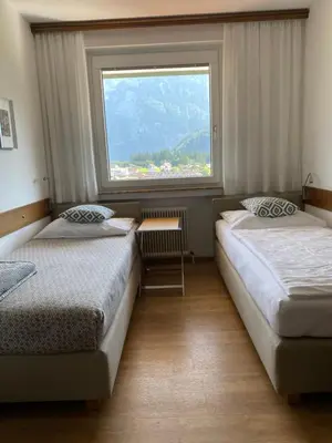 Ein Bett oder Betten in einem Zimmer der Unterkunft Ferienwohnungen Rettenbacher