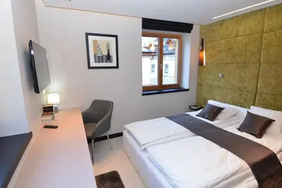 Ein Bett oder Betten in einem Zimmer der Unterkunft Andantino by Schladmingurlaub