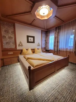 Ein Bett oder Betten in einem Zimmer der Unterkunft Ramsauer Sonnenalm