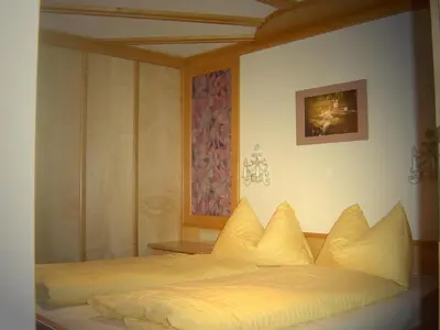 Ein Bett oder Betten in einem Zimmer der Unterkunft Ramsauer Sonnenalm
