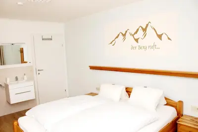 Ein Bett oder Betten in einem Zimmer der Unterkunft Riverhaus