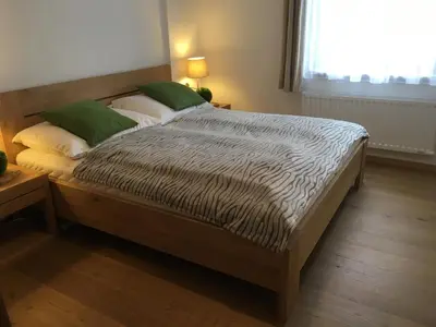 Ein Bett oder Betten in einem Zimmer der Unterkunft Ferienwohnung Kogelblick Gosau