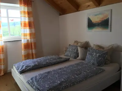 Ein Bett oder Betten in einem Zimmer der Unterkunft Ferienwohnungen Schlader