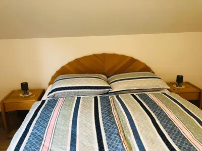 Ein Bett oder Betten in einem Zimmer der Unterkunft Alpine Appartments Ausseerland