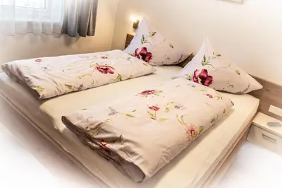 Ein Bett oder Betten in einem Zimmer der Unterkunft Eiblhof