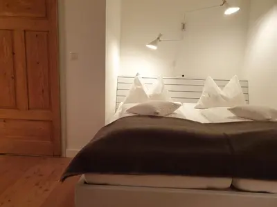 Ein Bett oder Betten in einem Zimmer der Unterkunft Schweigerhof