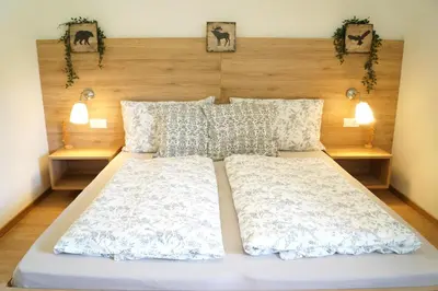 Ein Bett oder Betten in einem Zimmer der Unterkunft Sauschneidhof - Radstadt