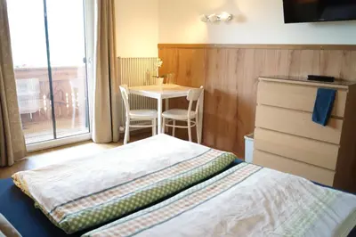 Ein Bett oder Betten in einem Zimmer der Unterkunft Sauschneidhof - Radstadt