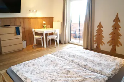 Ein Bett oder Betten in einem Zimmer der Unterkunft Sauschneidhof - Radstadt
