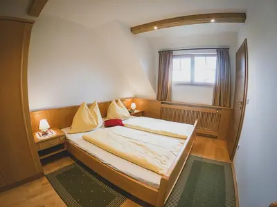 Ein Bett oder Betten in einem Zimmer der Unterkunft Appartements Macheiner