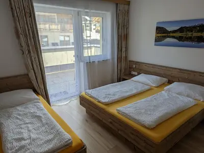 Ein Bett oder Betten in einem Zimmer der Unterkunft Appartements Gotthardt