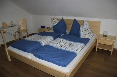Ein Bett oder Betten in einem Zimmer der Unterkunft Schröckerhof