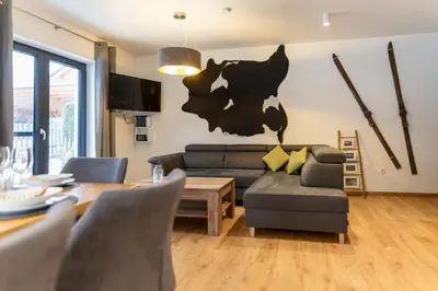 Ein Sitzbereich in der Unterkunft Chalet Reiteralm- SKI IN SKI OUT