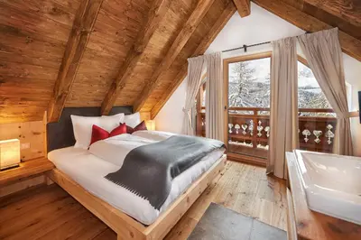 Ein Bett oder Betten in einem Zimmer der Unterkunft Chalets Almidylle