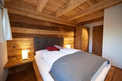 Ein Bett oder Betten in einem Zimmer der Unterkunft Chalets Almidylle