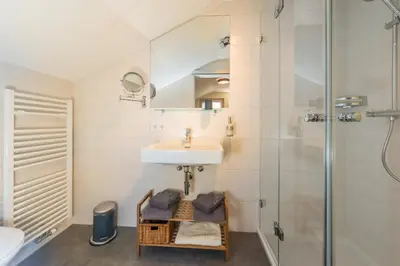 Ein Badezimmer in der Unterkunft Apartments Frechhof