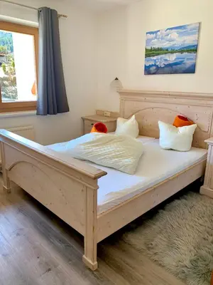 Ein Bett oder Betten in einem Zimmer der Unterkunft Appartmentanlage Isegrim