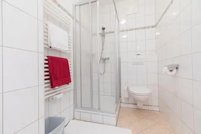 Ein Badezimmer in der Unterkunft Haus Roswitha