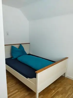 Ein Bett oder Betten in einem Zimmer der Unterkunft Apartment Sara