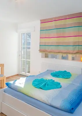 Ein Bett oder Betten in einem Zimmer der Unterkunft Appartement M&M