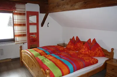 Ein Bett oder Betten in einem Zimmer der Unterkunft Hefenscherbauer