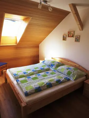 Ein Bett oder Betten in einem Zimmer der Unterkunft Tremlhof