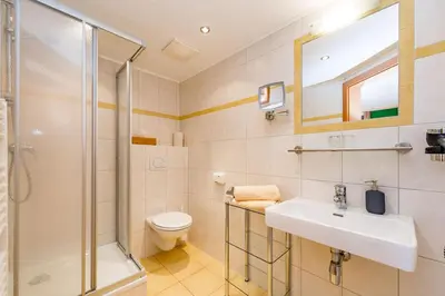 Ein Badezimmer in der Unterkunft Das kleine Bio Hotel Tiefenbach