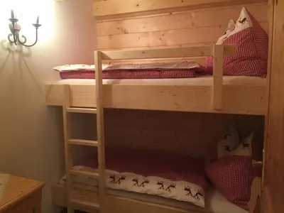 Ein Bett oder Betten in einem Zimmer der Unterkunft Jagdhütte